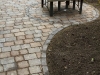 Paleo paver patio with outdoor fireplace and raised cedar bed - Ballard, Ecoyards.