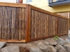Fence with bamboo panels and dark stain - Ballard, Ecoyards.com