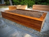 Raised planter bed with Ipe cladding.